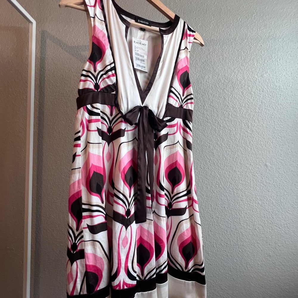 Bebe V-Neck Dress with Pink and Brown Accents 
Satin Bow & Hemline